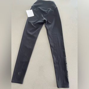 Brand new Barry’s black leggings with “Los Angeles” on the side - small text